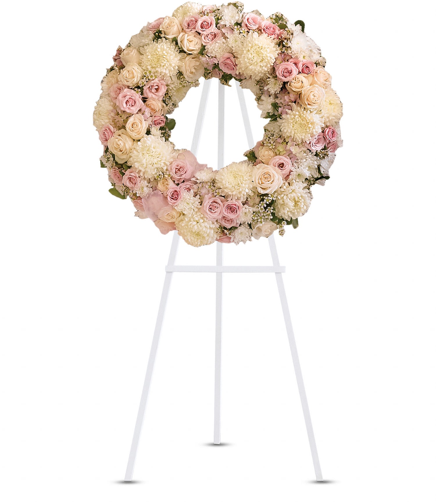Peace Eternal Wreath - A breathtaking expression of love and devotion, this lovely wreath delivers a message that is both subtle and strong. Its soft pastel blossoms will soothe, while its extraordinary beauty will express the depth of your emotions.  Gorgeous pink hydrangea, crème roses, light pink spray roses, white chrysanthemums, waxflower and more are adorned by pink organza ribbon in this eternal circle of peace. Approximately 24 1/2&quot; W x 24 1/2&quot; H