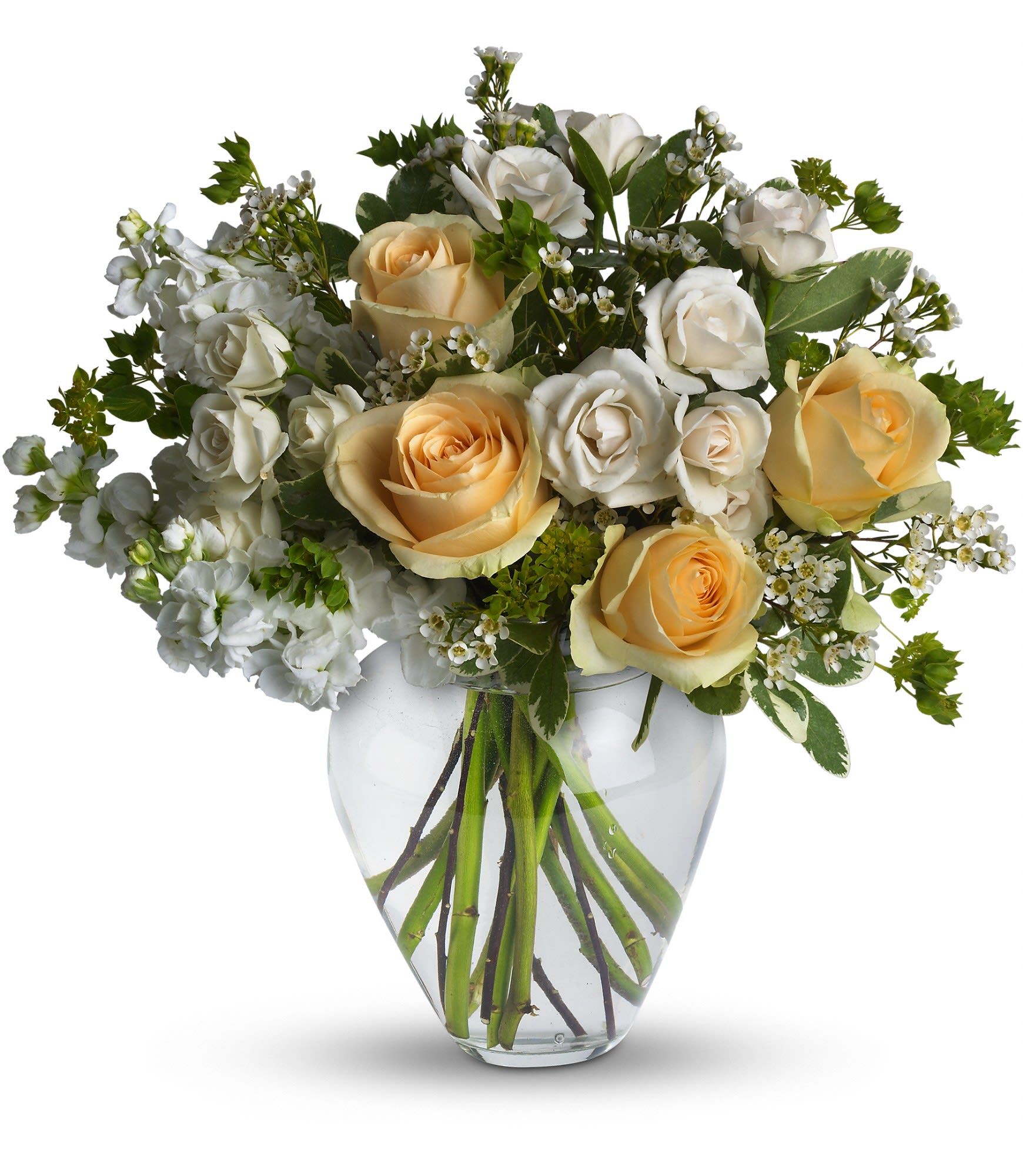 Celestial love - Peaceful and pure. This pretty arrangement of white and light colors will let anyone know they are in your thoughts.   Fresh flowers such as peach roses, crÃ¨me spray roses, white stock, waxflower and more are gathered in a beautiful clear vase. Approximately 16&quot; W x 16&quot; H 