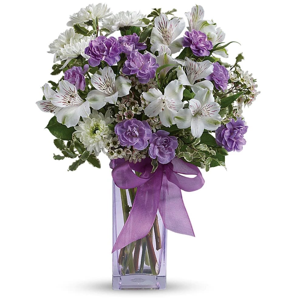 Lavender Laughter Bouquet - Spread the love, spread the laughter, with this perky lavender and white arrangement! Bursting with snow-white alstroemeria, miniature lavender carnations and delicate waxflower, this bouquet is finished with a glistening lavender ribbon for an extra special touch.