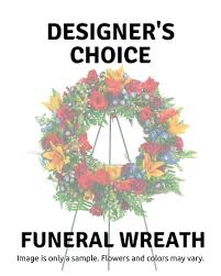 Designer's Choice Wreath  - Let our designers hand pick the freshest flowers to create a one of a kind sympathy wreath standing spray for you! By selecting the deluxe or premium option you can increase the size and flower quantity of the wreath. 