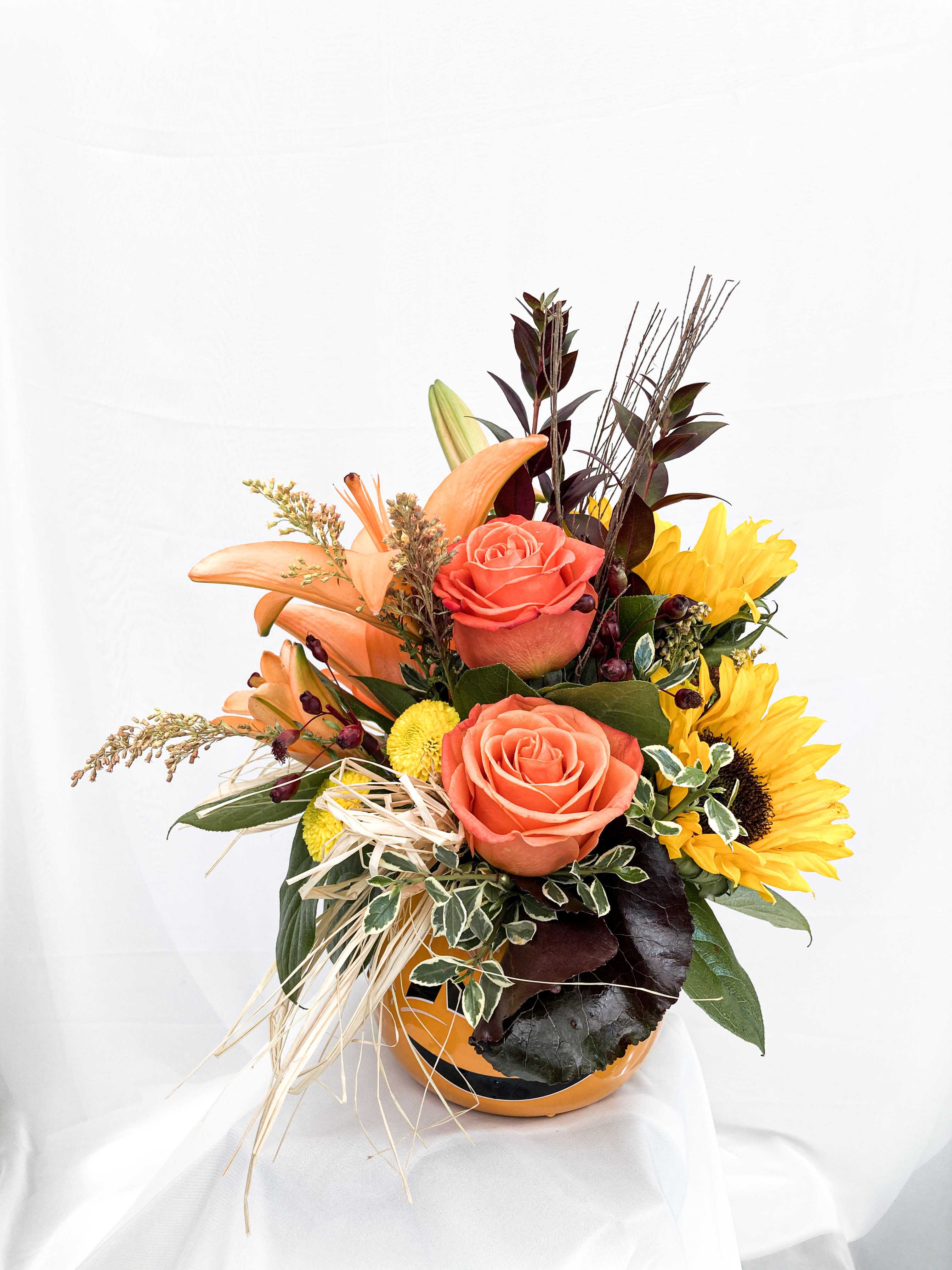 Pumpkin Florals - This is the perfect autumn arrangement for the season.