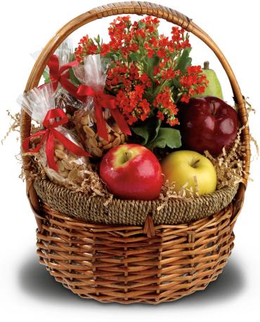 Health Nut Basket - Healthy fruits and nuts are presented with a pretty potted kalanchoe plant in a large wicker basket. Health food has never looked so good!  One pear, three apples, one bag of mixed nuts, one bag of peanuts and one bag of trail mix are gathered into a natural handled basket with a cheerful orange kalanchoe plant. 