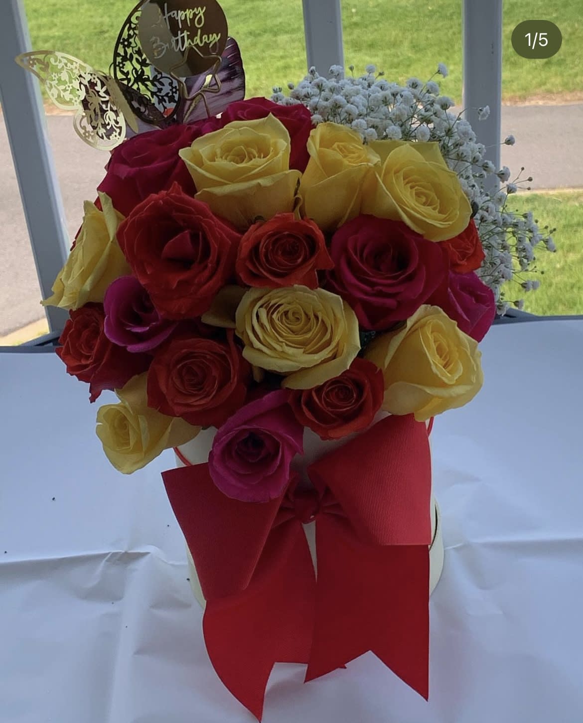 Yellow,red and pink roses along side baby breath arrangement by lav.ishbouquets  - Pink, yellow and red roses come together  for a bright cube of sunshine. This arrangement lights up any space and will improve anybody's day. A perfect gift for all occasions. 