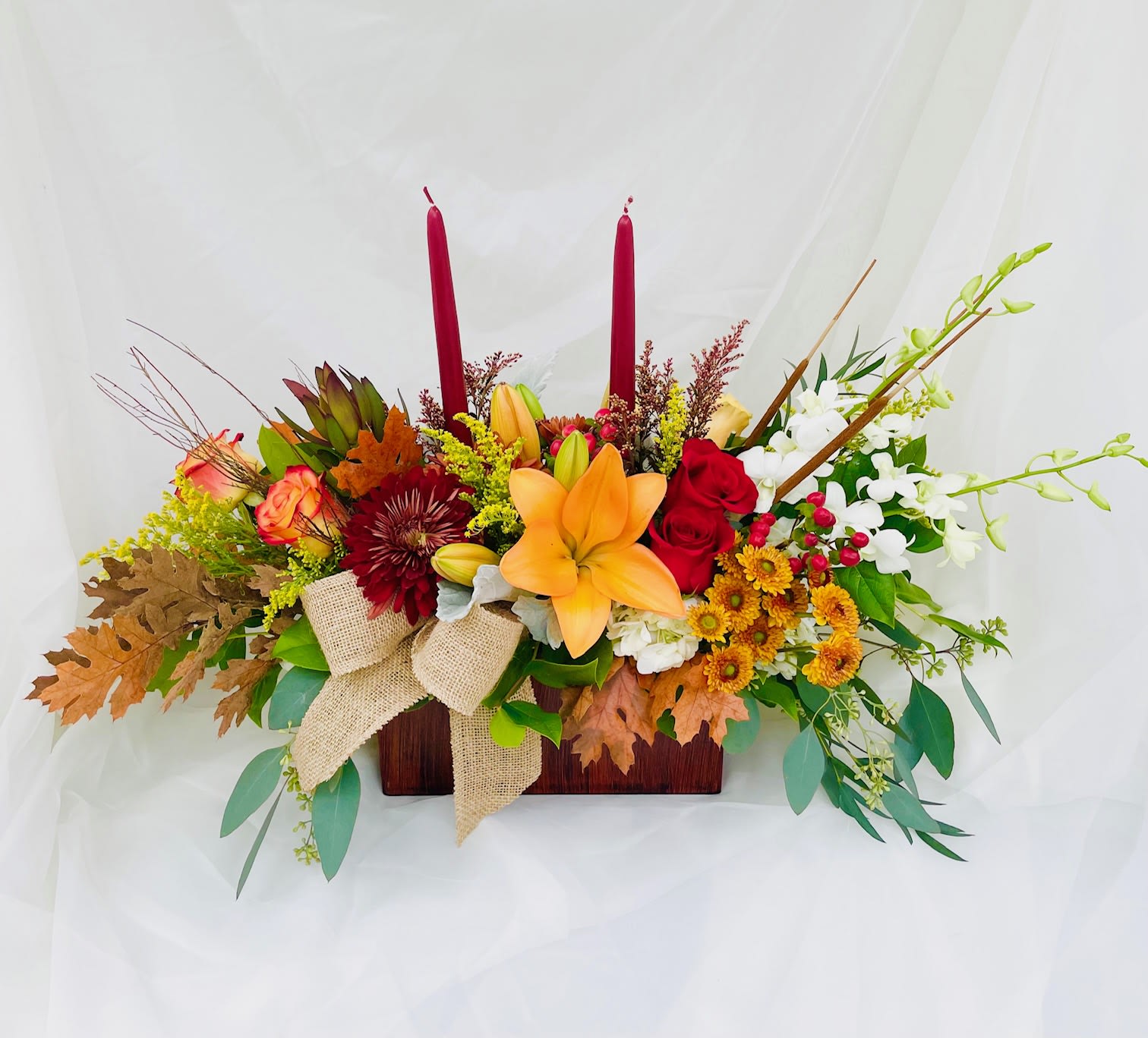 Changing Leaves - Box with an assortment of fall themed flowers.