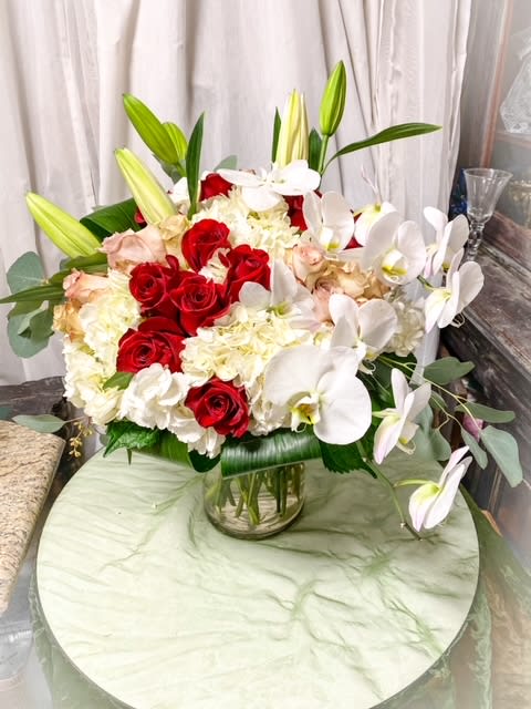 simple elegance  - Roses, Hydrangea, Orchids in a pedestal vase 