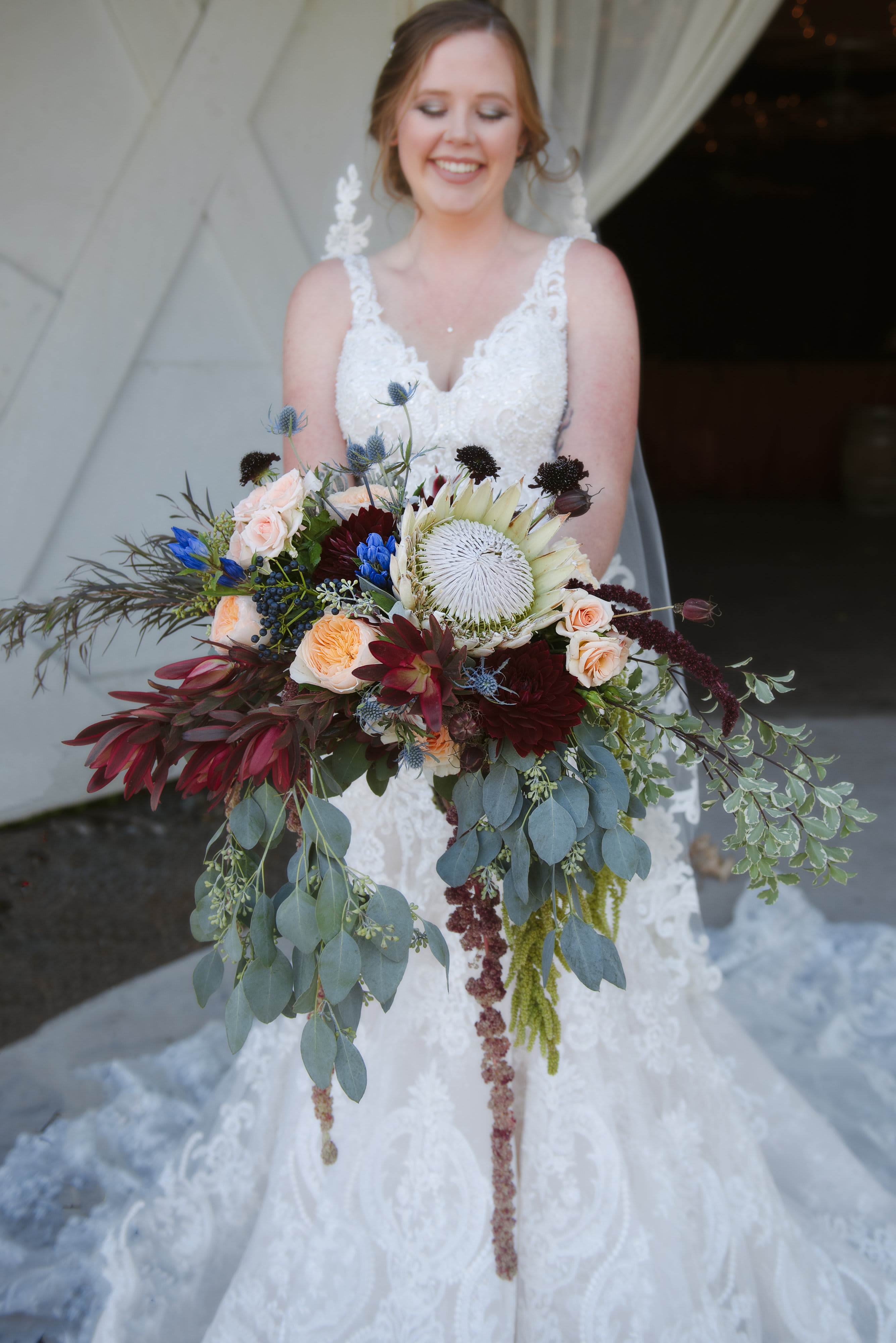 Custom Weddings/Wedding Packages. - Your Wedding Day is Our priority. Choosing your flowers with our wedding specialist will be the crowning touch of YOUR Special Day! Starting with YOUR BOUQUET,  We will help you build out Your floral finishing touches. Photos by Carrie Mayfield.