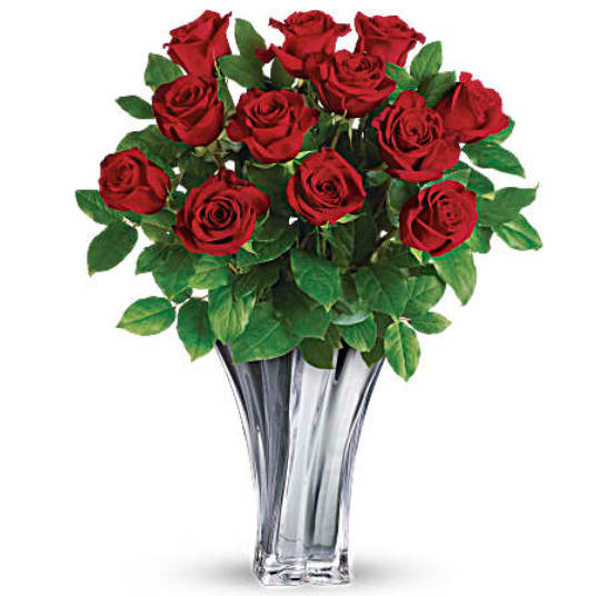 Teleflora's Flawless Romance Bouquet - &quot;The definition of romance! Celebrate your love with classic red roses in a shimmering, mirrored glass keepsake vase with modern twisted design. This romantic arrangement features 12 red roses and lemon leaf. Delivered in a Sterling Love Vase.   Orientation : All-Around  All prices in USD ($)  Standard  T19V210A  Deluxe  T19V210B  Premium  T19V210C&quot;