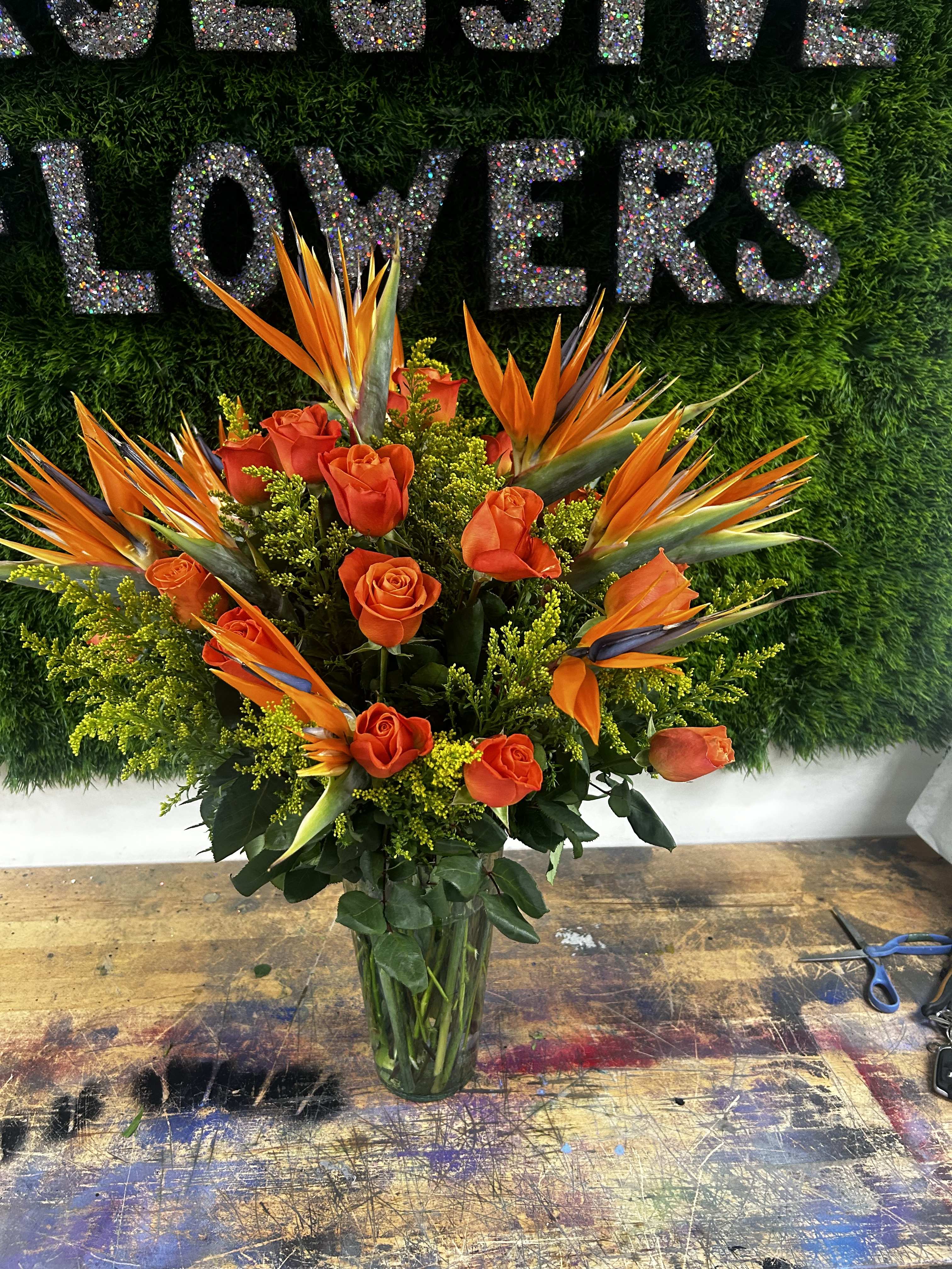 Vase of birds of paradise and roses - 1 dozen bird of paradise and 2 dozen of roses