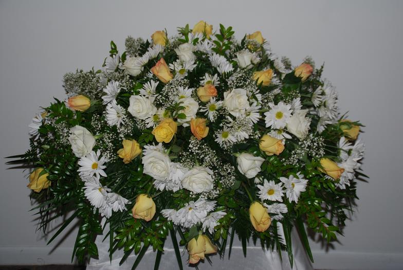 White and yellow Rose Spray - Beautiful spray with white and yellow roses, white daisies, and green plants.