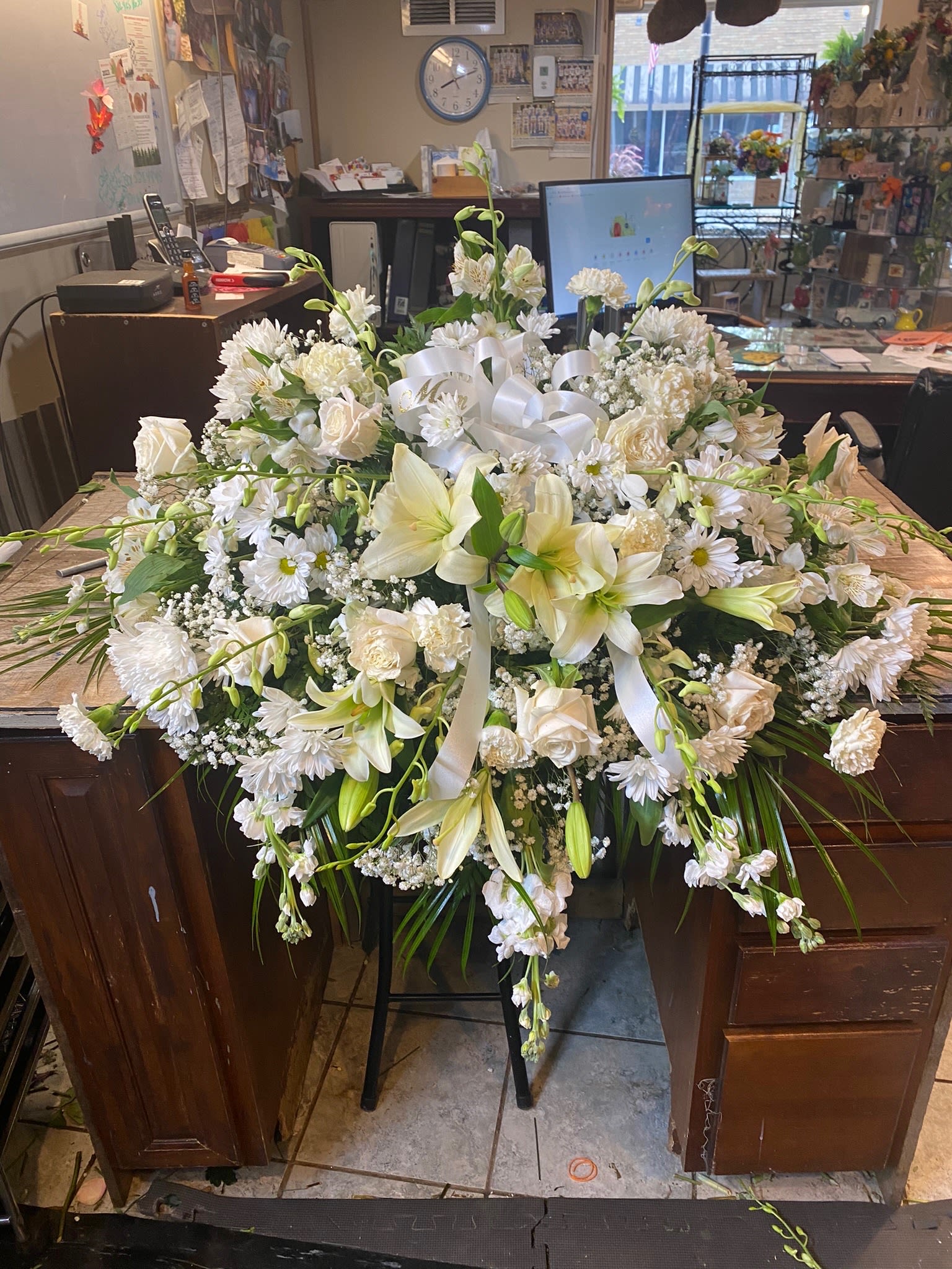Stunning as the clouds Stunning as the clouds - All white mixed flowers in greens that belong in the heavens