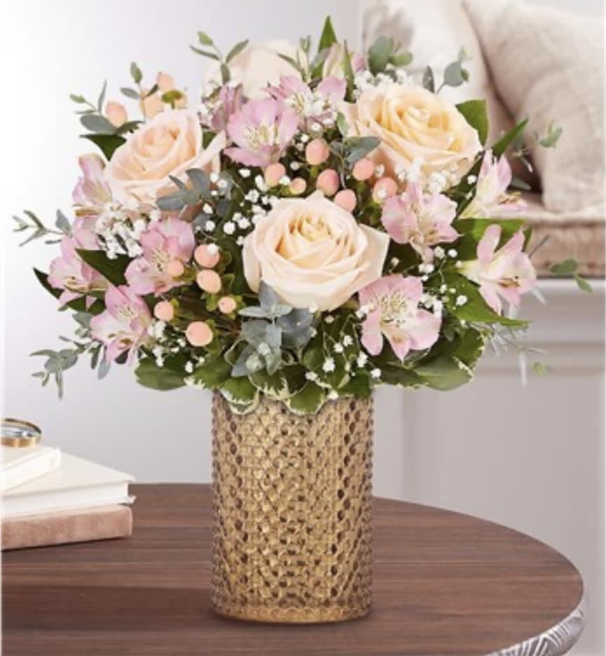 Perfectly Peach™ Bouquet - Our pastel bouquet delivers the sweetest of sentiments. A mix of soft-hued blooms is gathered in our vintage-style hobnail vase inspired by the Victorian era. Featuring a champagne mercury finish, it’s a gift that helps you say it perfectly…and beautifully. • All-around arrangement with peach roses and pink Peruvian lilies (alstroemeria); accented with peach hypericum, baby’s breath and assorted greenery • Artistically designed in our hobnail vase, styled in a champagne mercury finish, adding vintage flair to any décor; measures 6&quot;H x 4&quot;W • Large arrangement measures approximately 12&quot;H x 14&quot;W • Small arrangement measures approximately 12&quot;H x 10&quot;W • Our florists hand-design each arrangement, so colors and varieties may vary due to local availability