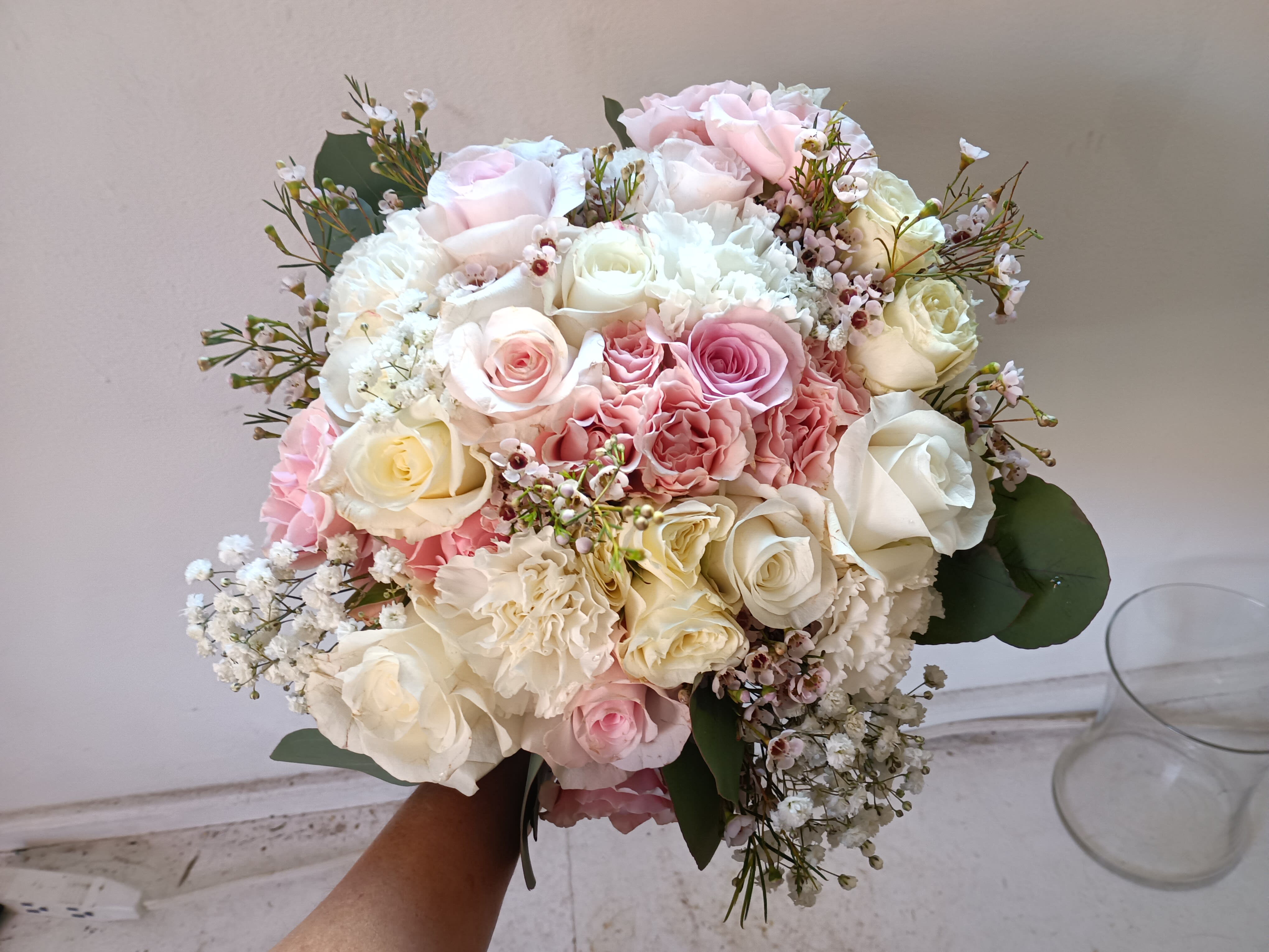 Allie's bridal bouquet - Beautiful and airy white and light pink standard and spray roses, carnations, pink wax flower and baby's breath round hand tied bridal bouquet 