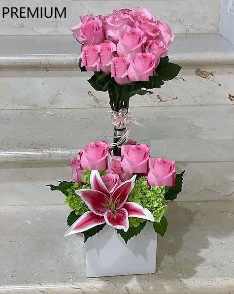 Pink Rose Topiary - Rose Topiary arranged in square ceramic or glass container.  Standard-  with 12 Pink Roses Deluxe-  with 18 Pink Roses  Premium with 24 Pink Roses.  