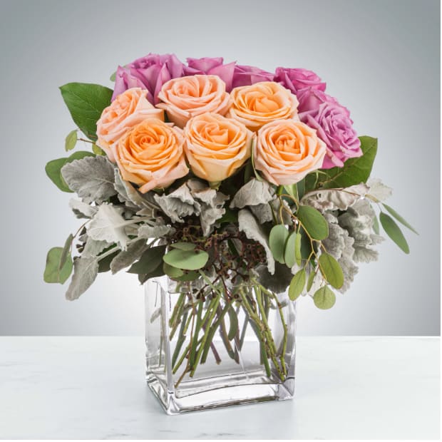 Gemini by BloomNation™ Gemini by BloomNation™ - This luxury arrangement is a lovely and soft rose arrangement that will surely make the recipient gasp. Perfect for Valentine's Day, Anniversaries, or saying "I love you". Approximate Dimensions: 15"D x 18"H