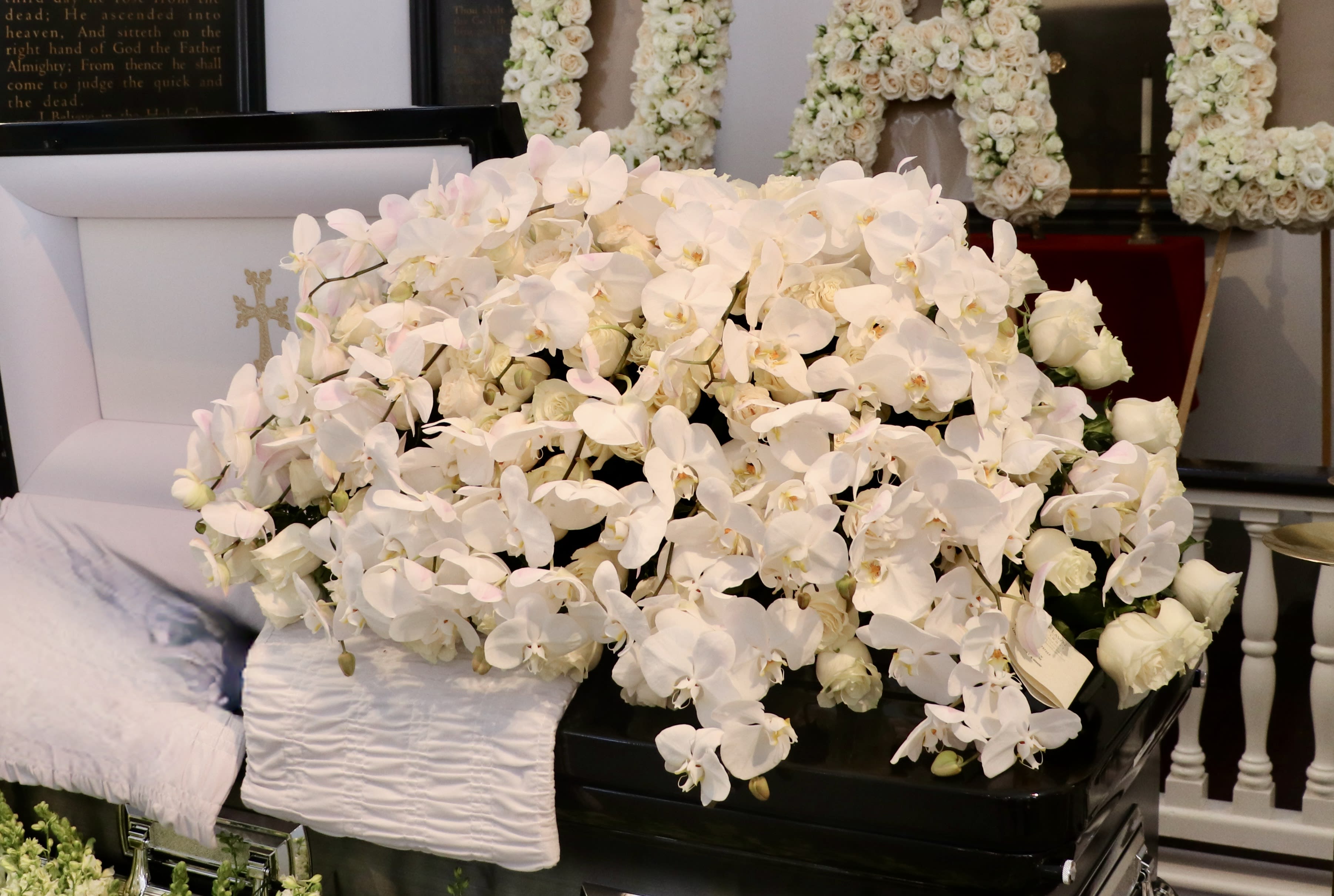 White Rose and Orchid Casket Spray - My Glendale Florist - This casket display is made with premium white roses and beautiful cascading orchids.