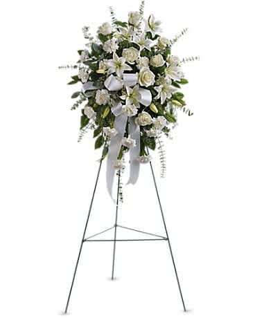Sentiments of Serenity Spray - Beautifully simple, this lovely spray of white roses, lilies and carnations decorated with white satin ribbon is a tasteful way to express your sympathy. The elegant spray includes white roses, white Asiatic lilies and white carnations, accented with assorted greenery.