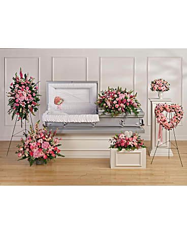 Teleflora's Beautiful Memories Collection - Soft and serene, this glorious collection of seven hand-made sympathy pieces celebrate your beautiful memories with the feminine grace of peaceful pink blooms. Teleflora's Beautiful Memories Collection includes the following six sympathy set pieces: Beautiful Memories Casket Spray, Divine Serenity Casket Insert, Glorious Farewell Spray, Rose Garden Heart, Teleflora's Graceful Glory Bouquet DX, Teleflora's Heartfelt Farewell Bouquet DX, Teleflora's Soft And Tender Bouquet DX