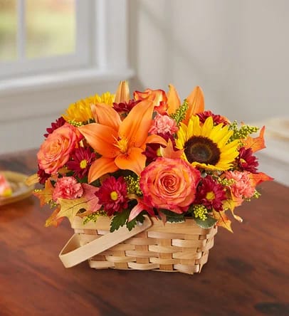 Fields of Europe Basket - An orange and yellow bouquet perfect for the Autumn time. From $55.