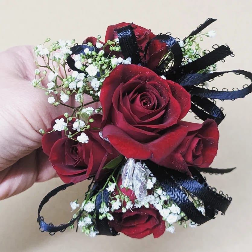 Red Rose Corsage - A classic red rose Corsage that compliments any suit. Perfect for prom, formal or wedding events.