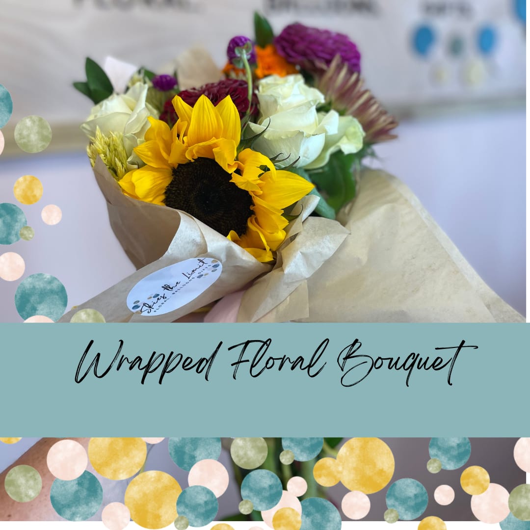 Wrapped Floral Bouquet - We will select our freshest mix of flowers that we have in the cooler! The bouquet will be wrapped and tied for a laid-back styled arrangement.   *Does not come in water with a vase.