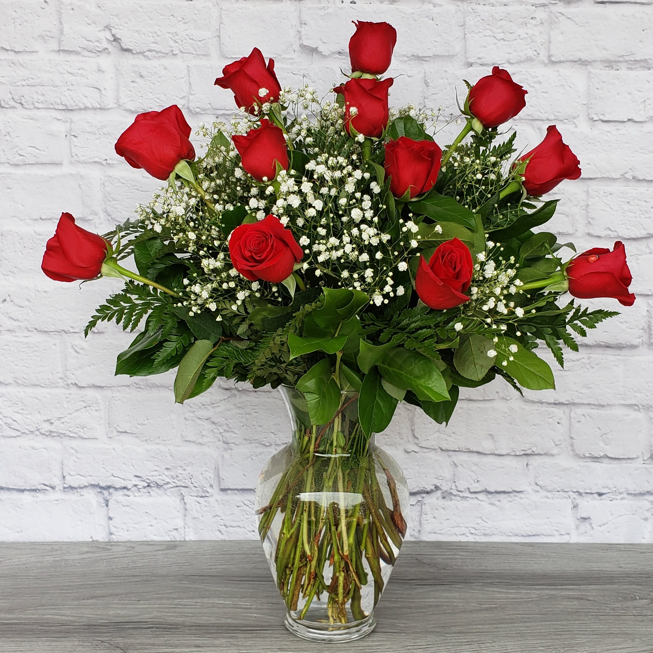 Dozen Long Stemmed Red Roses  - These dozen red roses with baby's breath are classic! Perfect romantic gift for Valentine's Day or an Anniversary.   All Round Orientation 24” Tall 24” Wide 