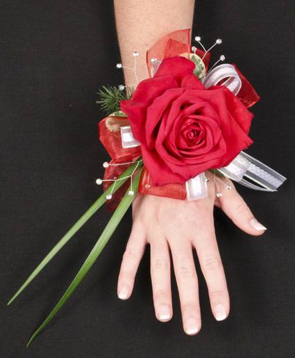 ROMATIC RED WRIST CORSAGE - PLEASE SPECIFY COLOR ROSES WITHY MIXED GREENS DEL HAS RHINESTONES PREM HAS  RHINESTONE BRACELET