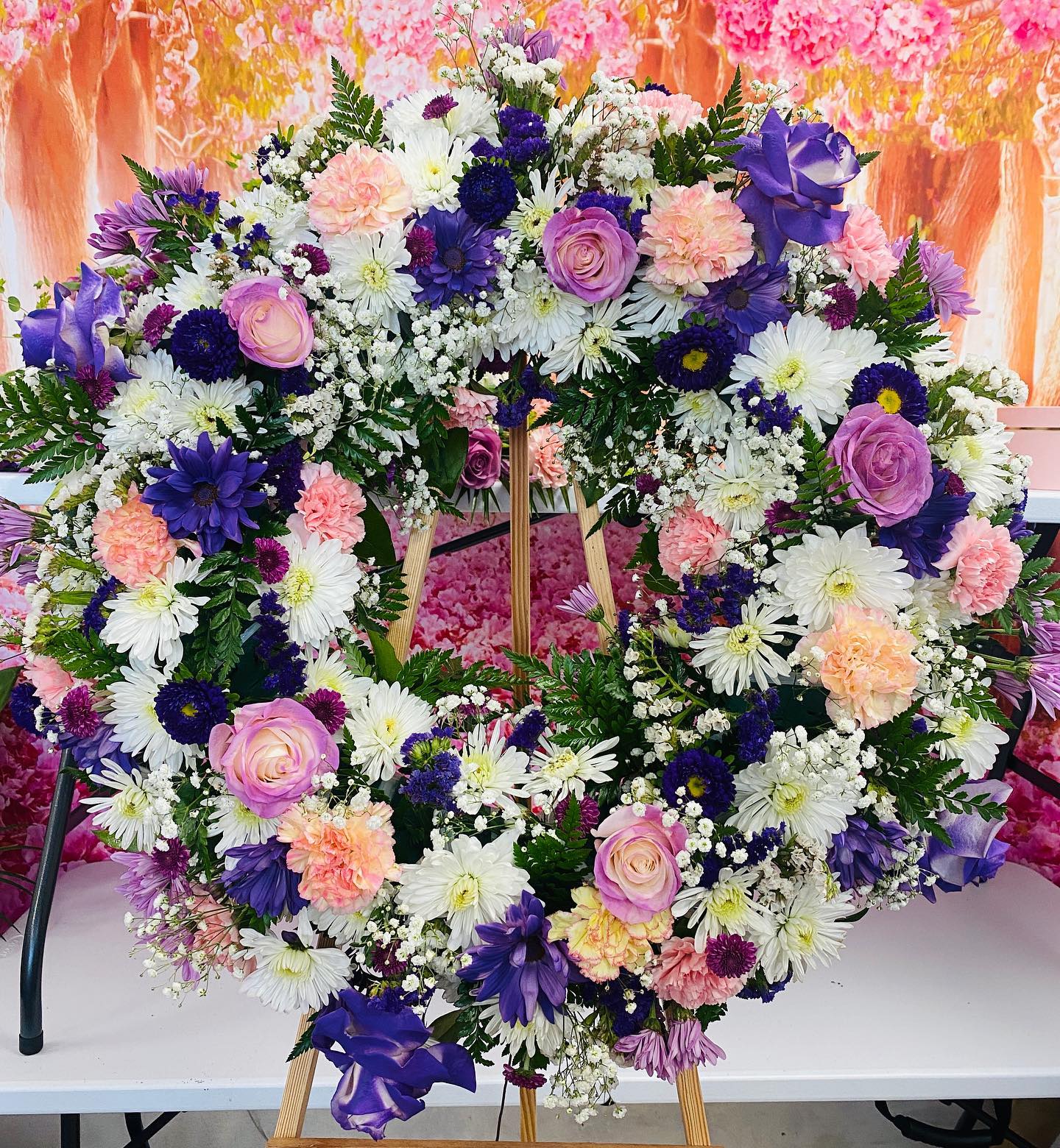 Medium Wreath With Mix Flowers Medium Wreath With Mix Flowers - Special to her, this is a medum wreath with mix flowers.