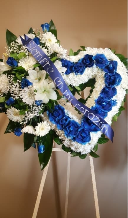 In The Heavenly  - A heart with natural flowers to give sympathy and condolences and remember your love one
