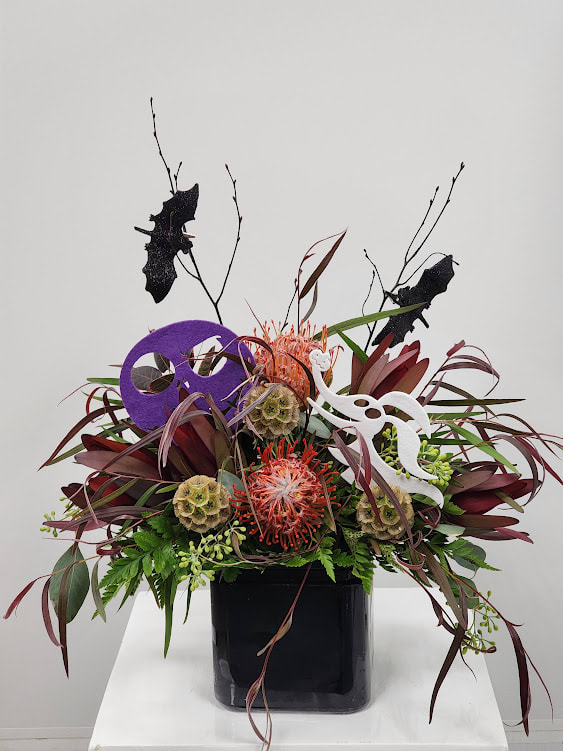 Night before Halloween by Strelitzia Flower Company