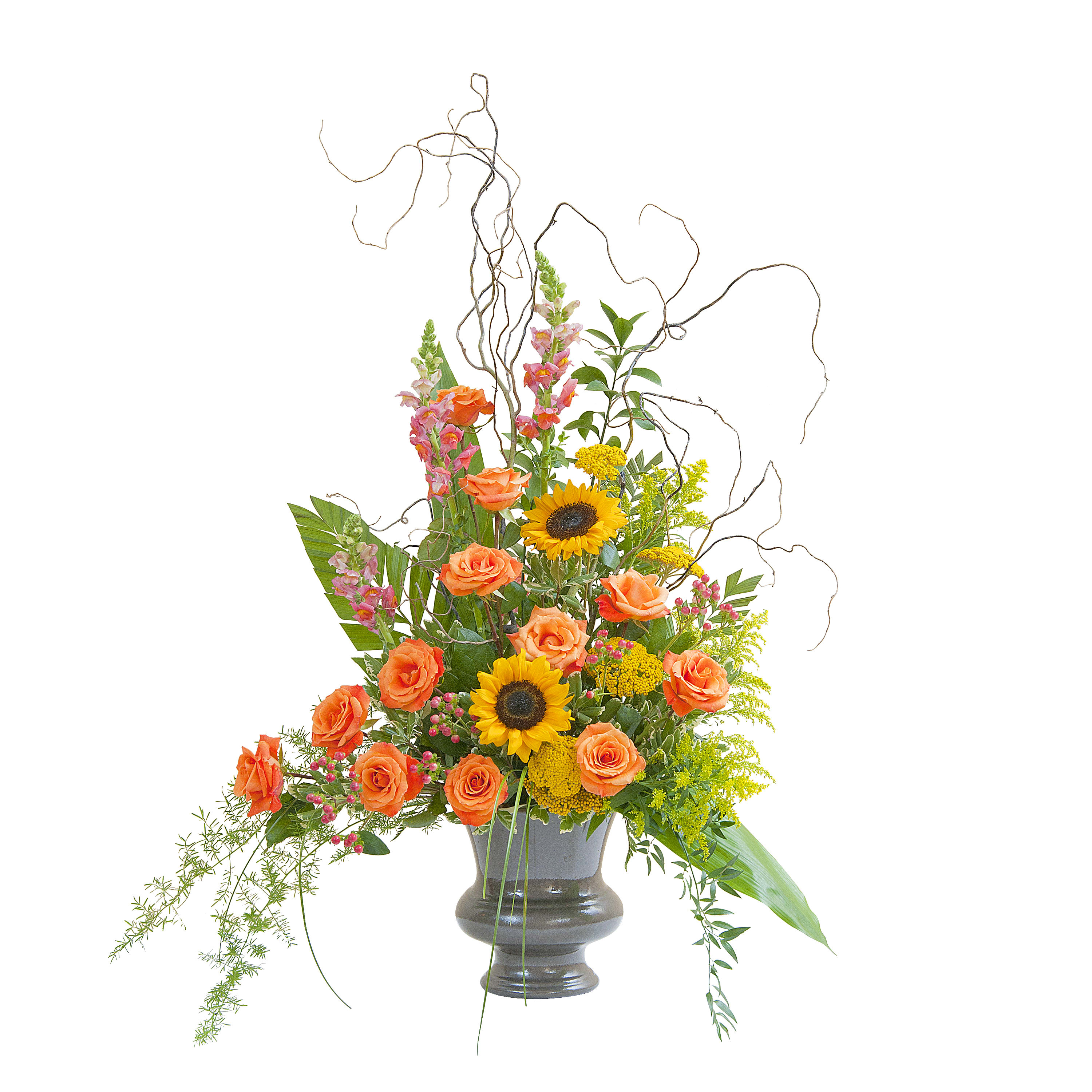 Heaven's Sunset Large Urn  - The colors of sunset are evident in this urn filled with Sunflowers, Roses, and accents of other premium flowers and foliage. Approximately 16&quot; wide by 34&quot; high