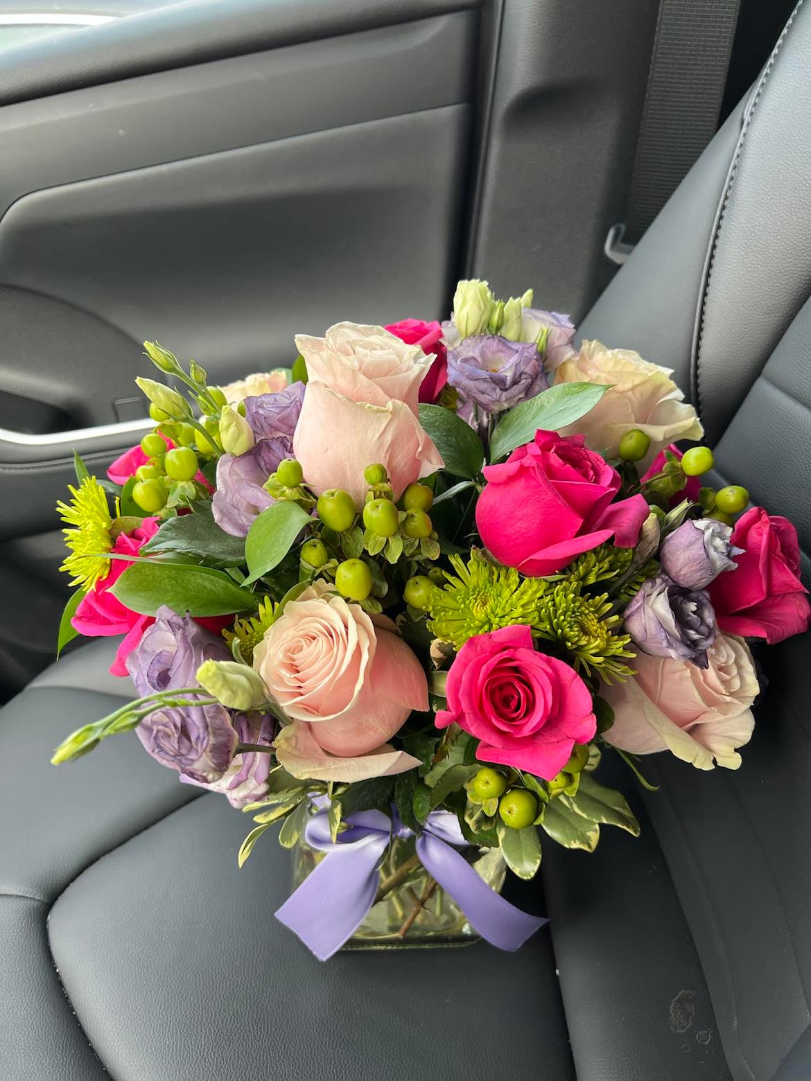 Jolie by Bloom by Nancy - This arrangement includes Roses, Lisianthus, Mums