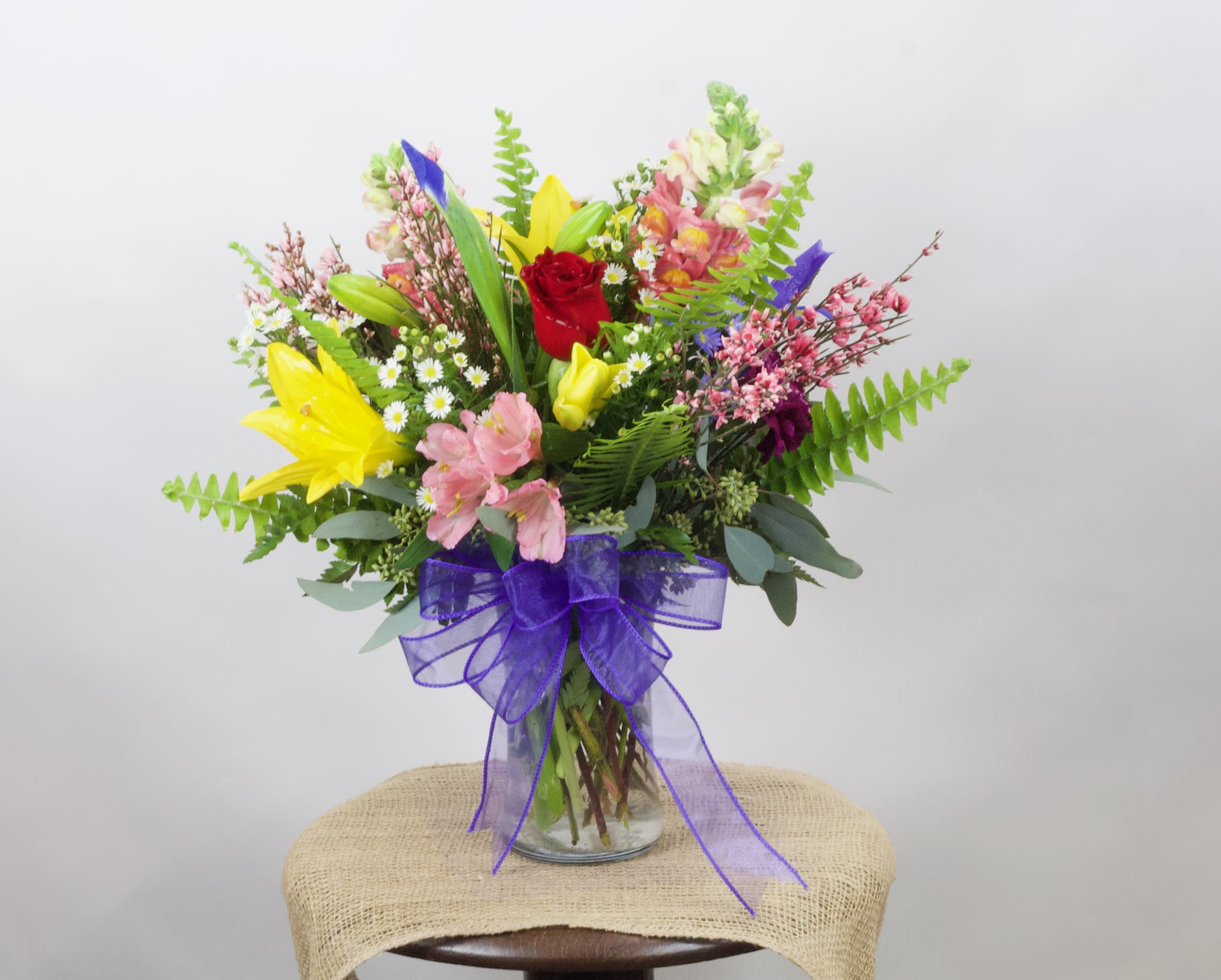Cutie Pie - Mixed arrangement with lilies, stock, roses, and more.