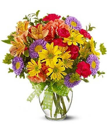 Get Well Soon Get Well Soon - A summery mix of yellow daisy chrysanthemums, purple asters and hot pink and orange carnations - arranged in a clear ginger vase and adorned with a cheerful yellow plaid bow - will make their wishes come true! Yellow daisy spray chrysanthemums, purple Matsumoto asters, hot pink miniature carnations, orange carnations and alstroemeria - accented with bupleurum - are delivered in a miniature ginger vase adorned with a plaid yellow ribbon. Approximately 9" (W) x 12" (H) Orientation: All-Around As Shown : TFWEB164