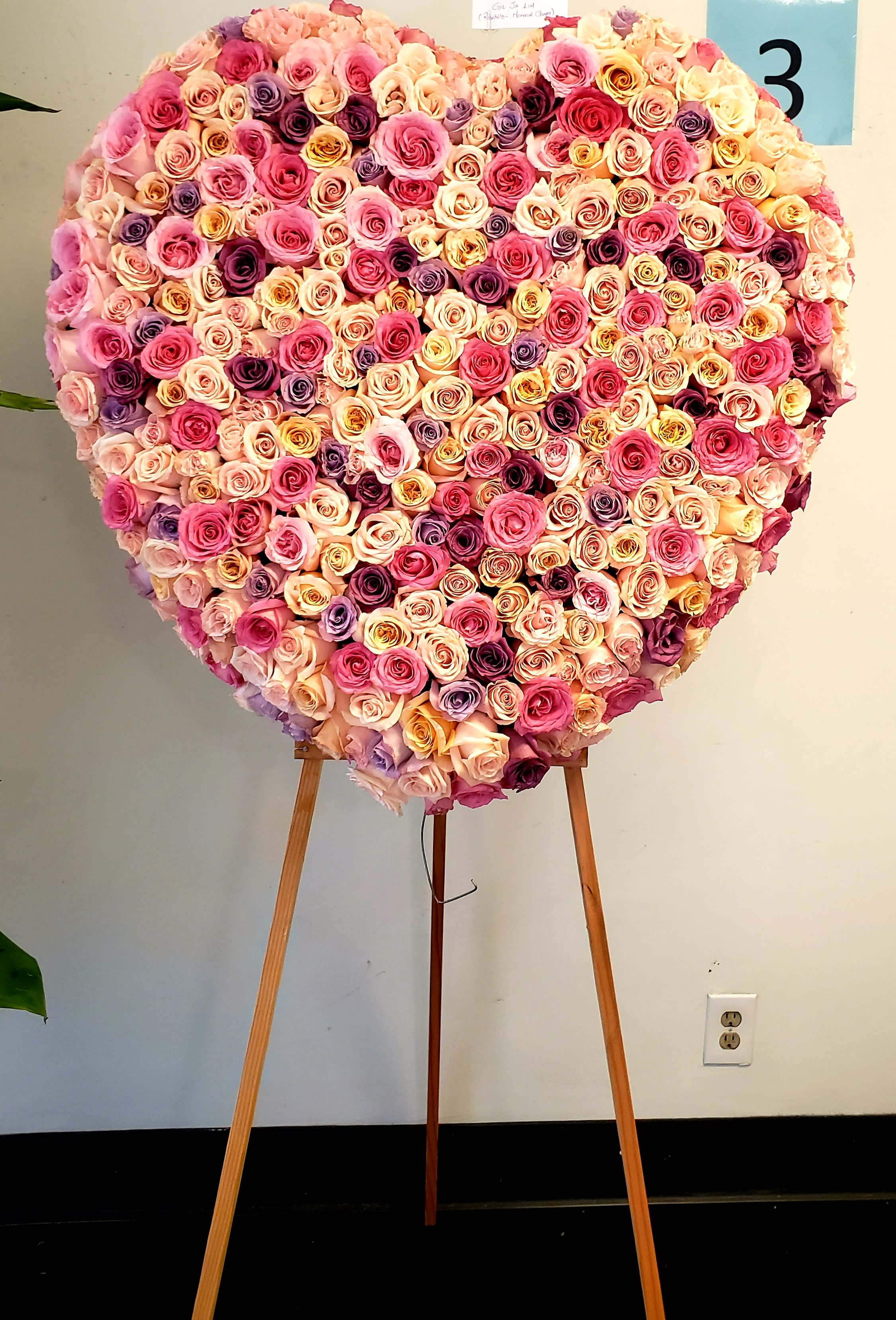 In Our Hearts Forever (premium shown) In Our Hearts Forever (premium shown) - Solid oasis heart covered entirely with roses. Standard size is 18" covered with over 150 roses, Deluxe size is 24" covered with over 225 roses, Premium size is 27" covered with over 300 roses.