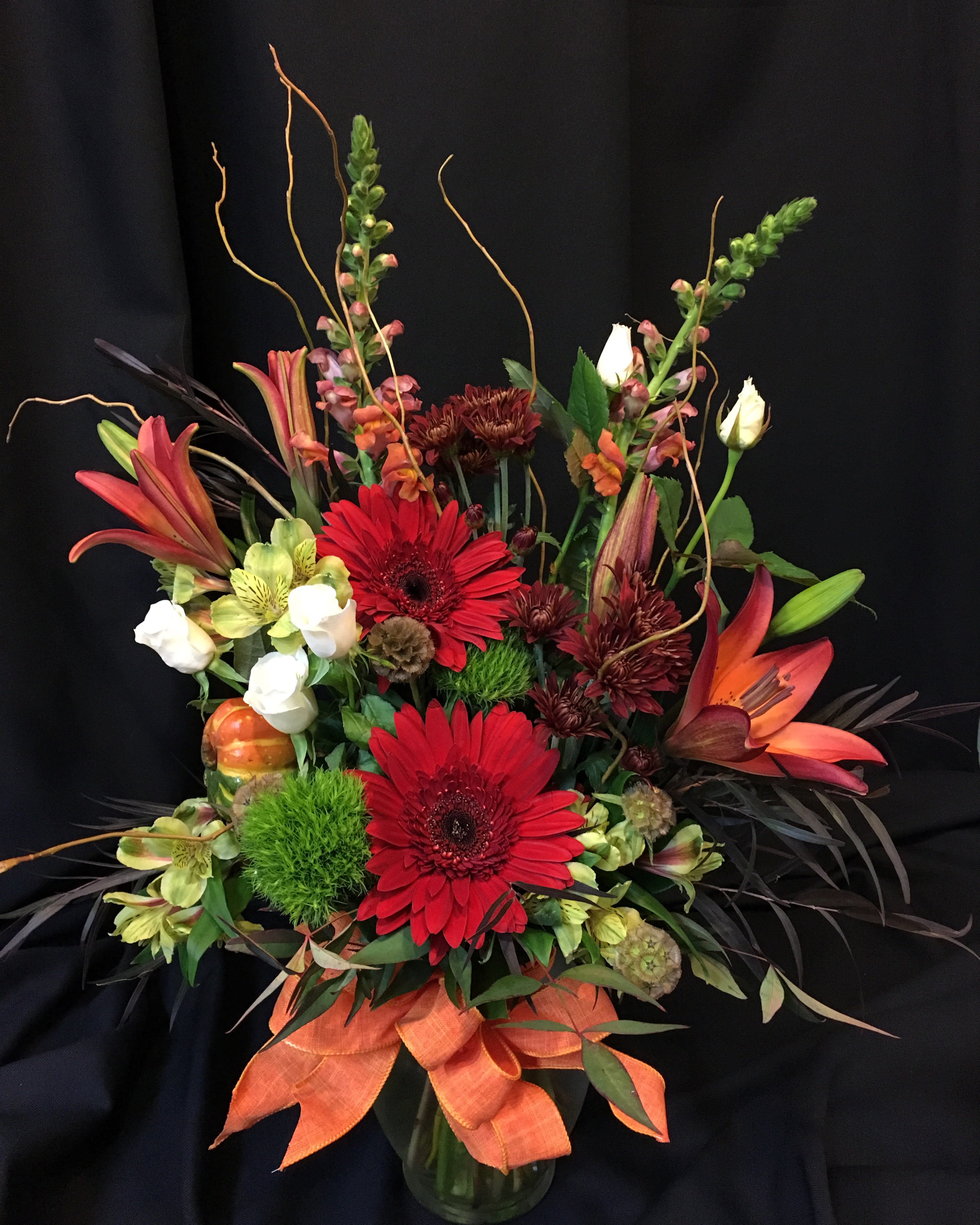Autumn Colorful mixed vase - Splendid bright fall color and accents. Flowers and colors will vary. Shown is our medium size mixed bouquet. 