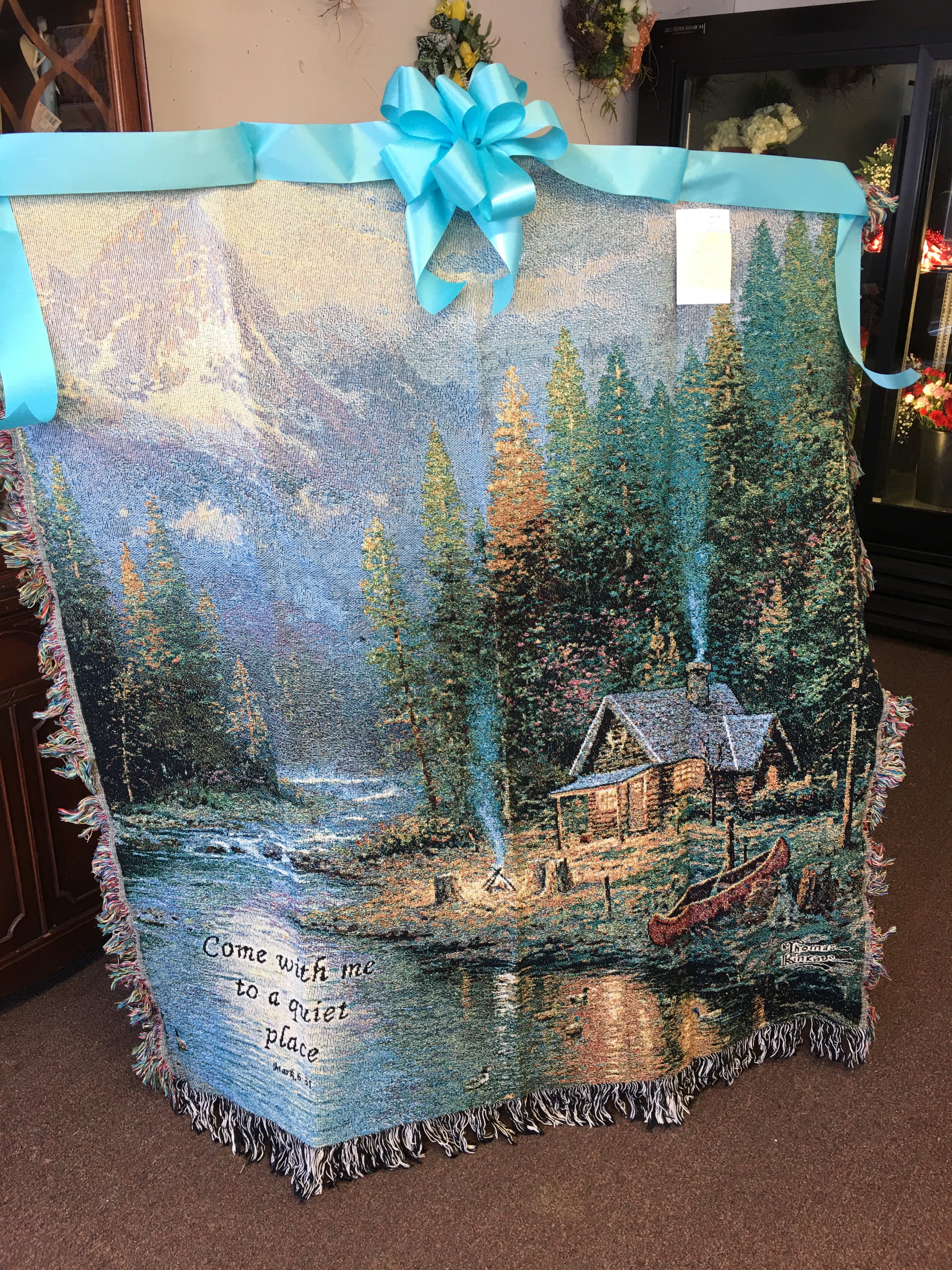 Memorial throw - We have different throws to choose from. Footprints in the sand, guardian angel, They are Thomas Kincade throws. This price is wrapped with a bow displayed on easel is extra. $75.00. 