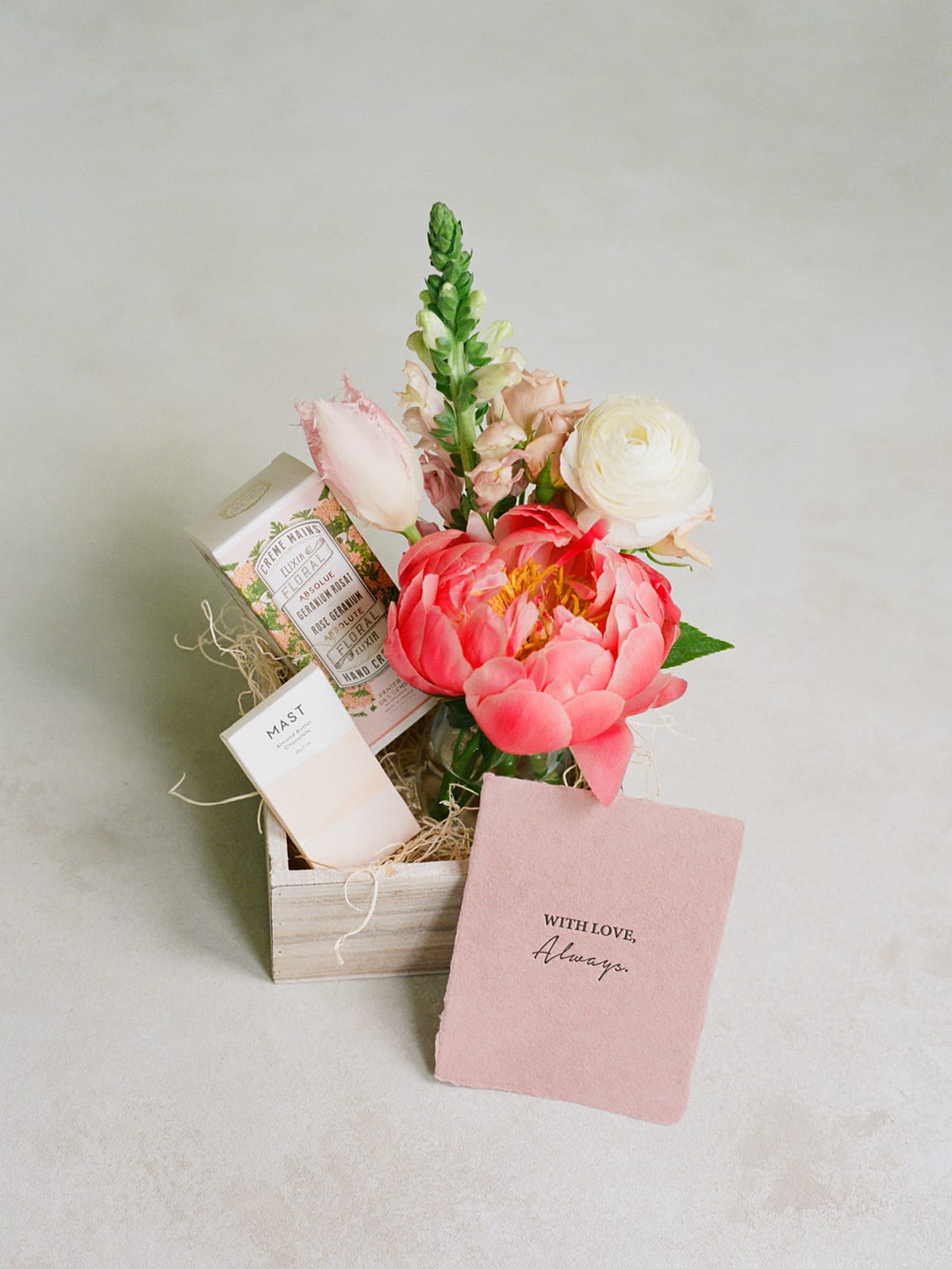 With Love, Always  - A mini seasonal arrangement, chocolate bar, Panier des Sens hand cream, a handmade card and a wooden keepsake box.  