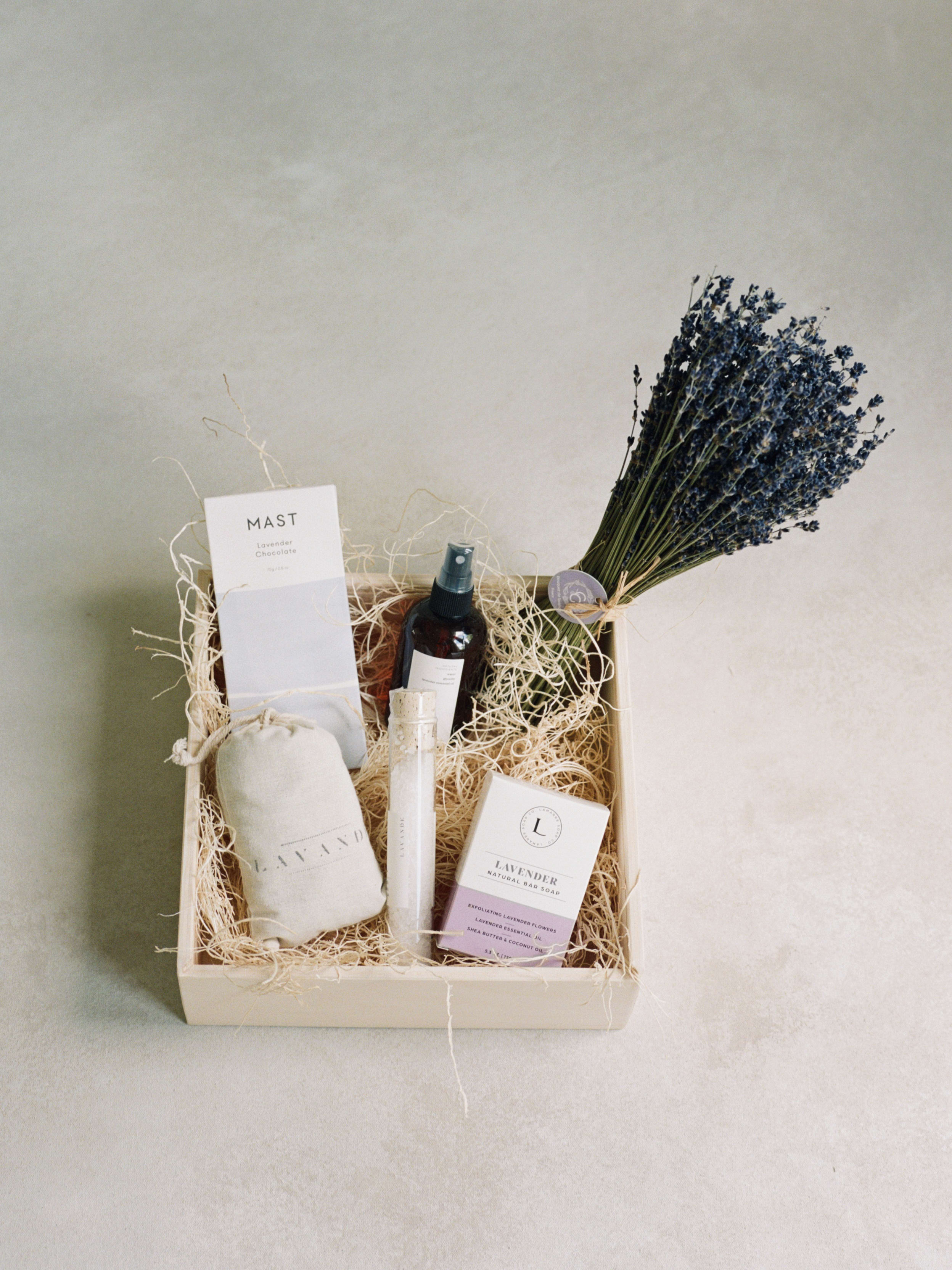 The Lavender Gift Box  - The perfect relaxing gift. A lavender chocolate bar,  lavender bar soap, lavender dried bundle,  lavender sachet, Lavender mosquito spray, and bath salts, all designed in a wooden keepsake box with a handwritten card. 