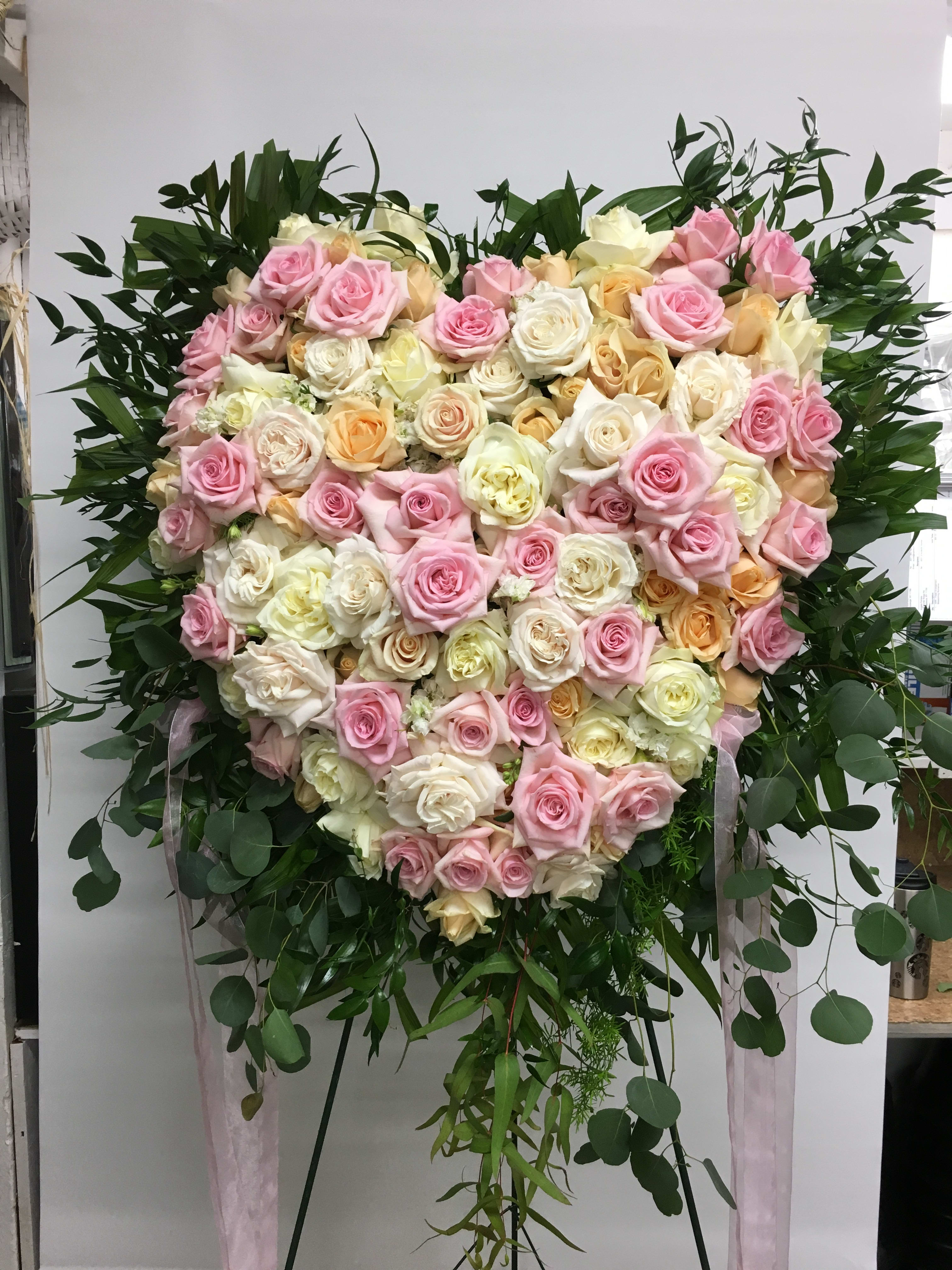 Sympathy Rose Spray Sympathy Rose Spray - Multicolored heart, equipped with large roses.