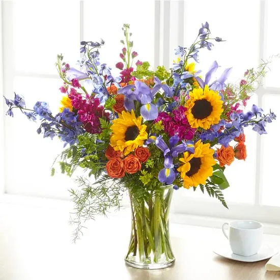 Rays of Life Bouquet - Show your loved ones how much you care with a bouquet full of bright, vibrant summer blooms. This bold bouquet is designed by a local florist, and is best fit for a home or residence.