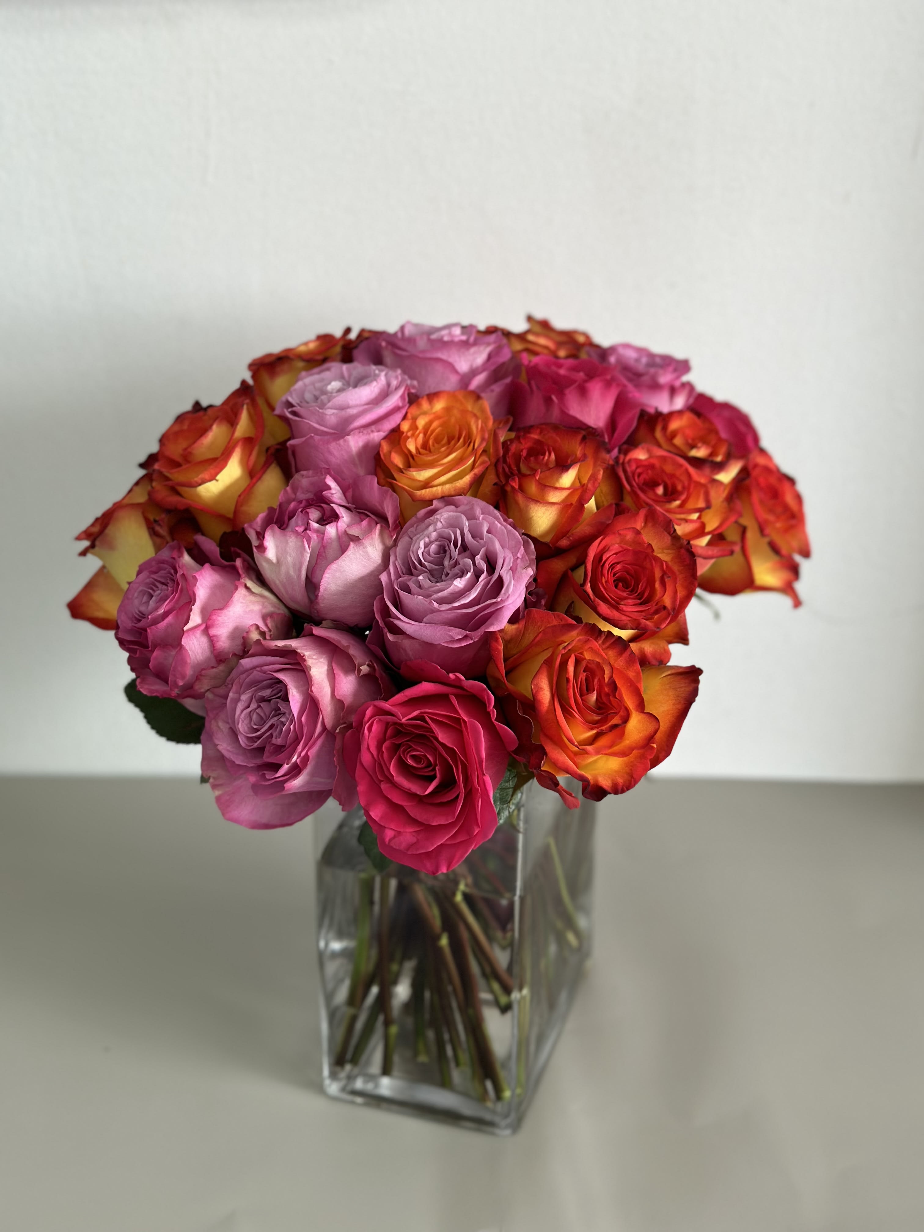 Dreaming Story  - A breathtaking arrangement of roses in glass vase for that special someone. 