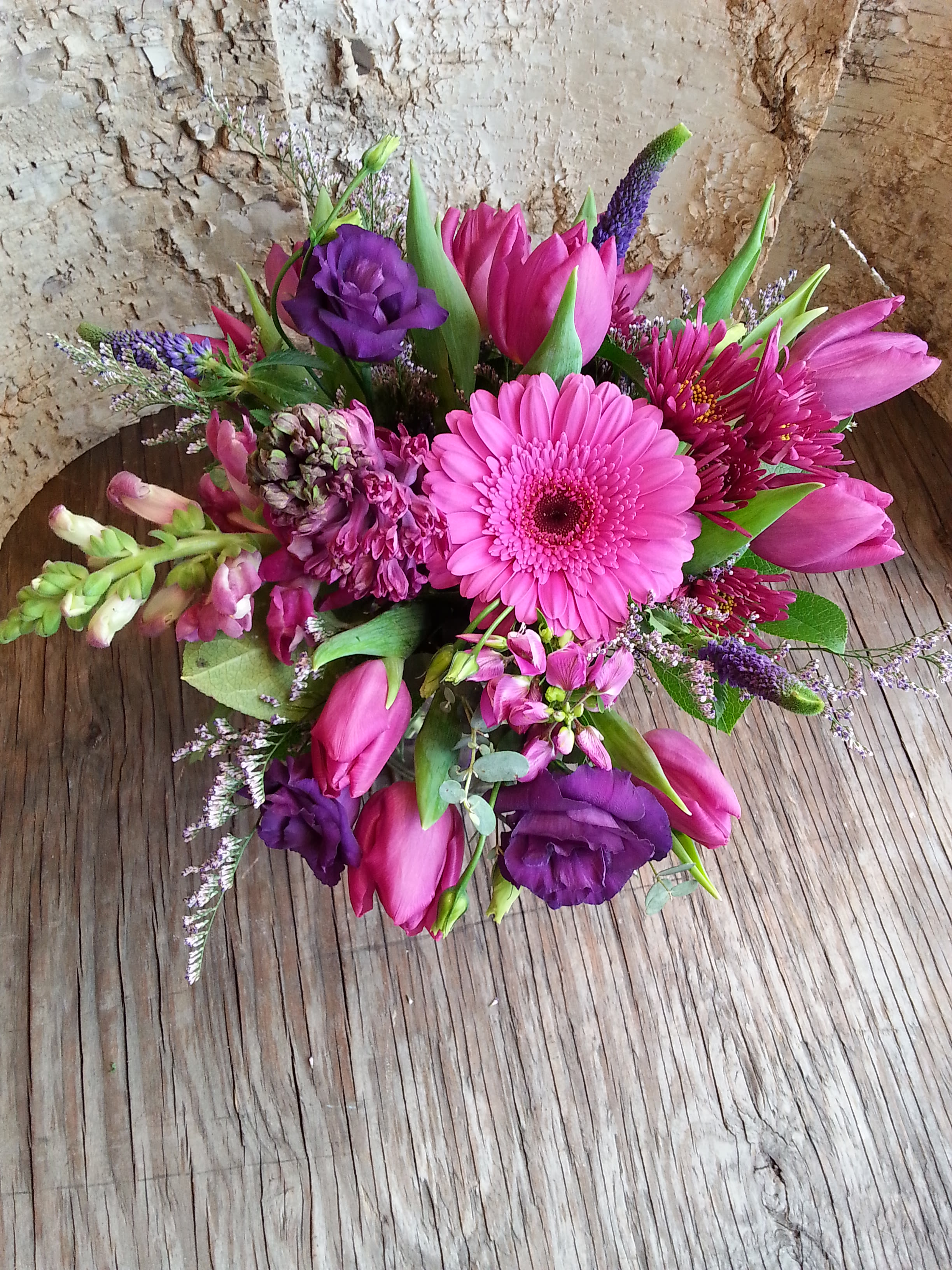 A Study in Purple - Our freshest and most intriguing blossoms in a variety of purple tones. Lush, lush and compact, cool and casual. 