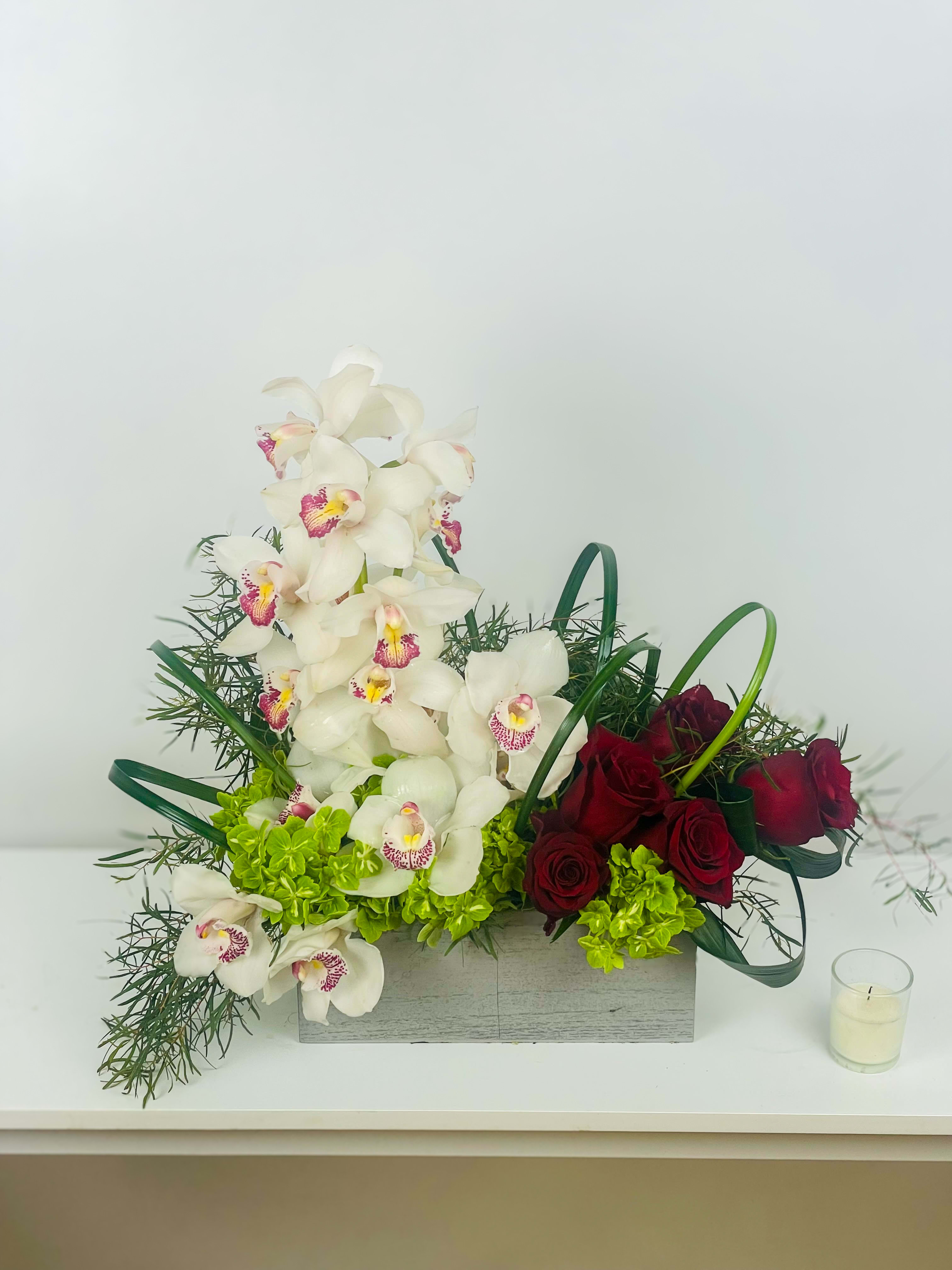 Stylish - Beautiful Arrangement with cymbidium orchid and roses and hydrangeas 