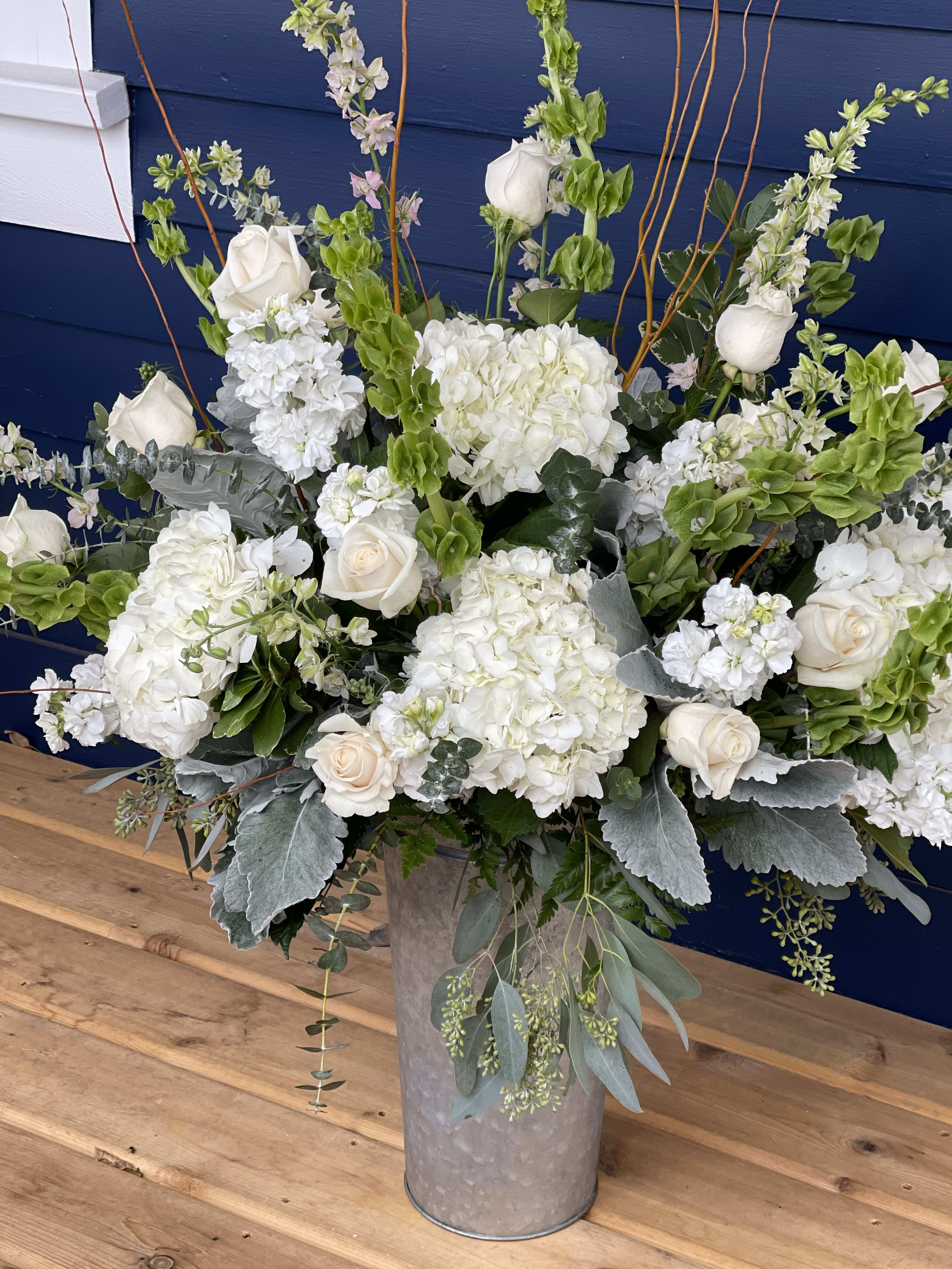 Honor and Grace - A very grand choice to express your sympathy. Elegant in grandeur and color. Suitable for any service or memorial. 