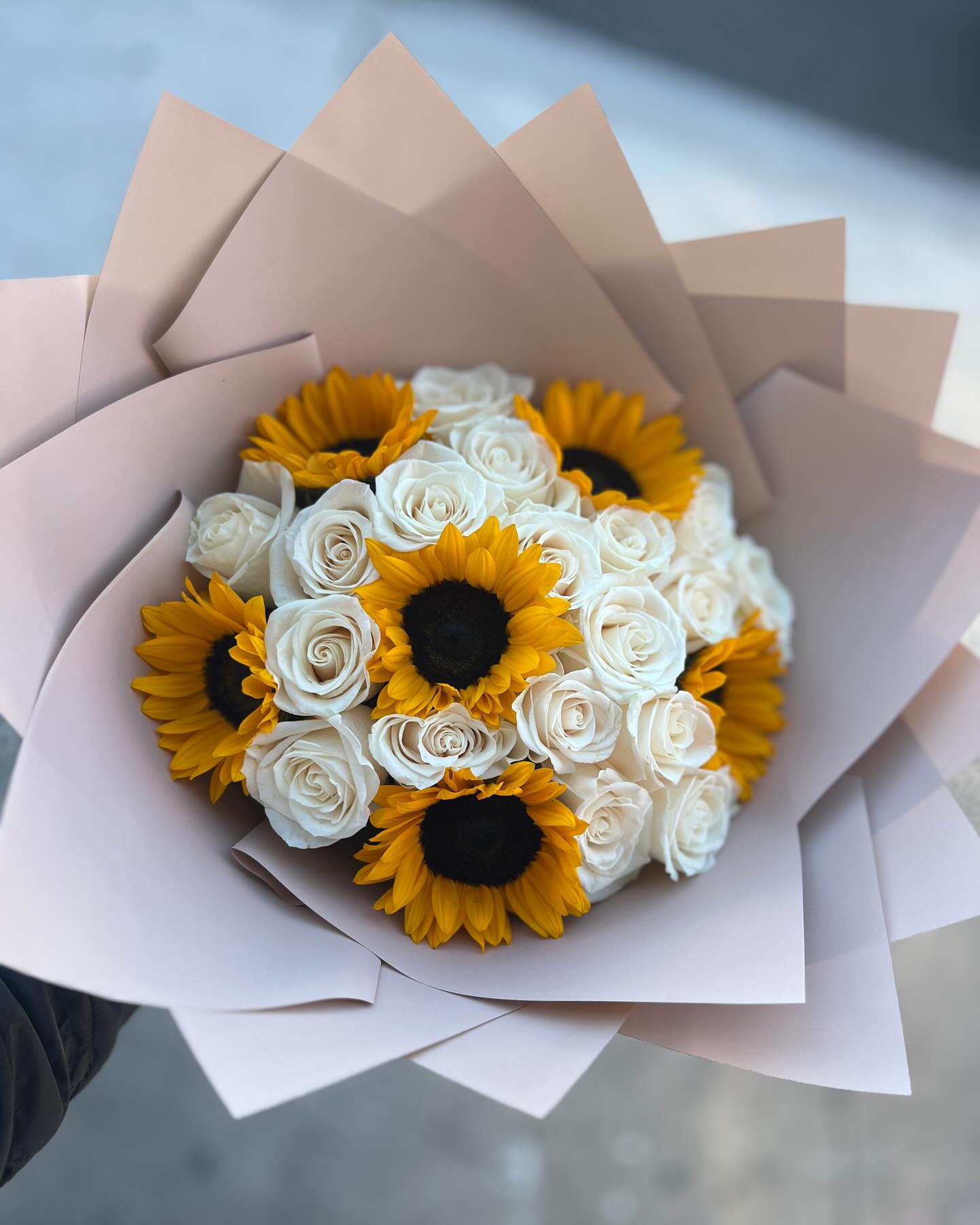 White roses and sunflowers top