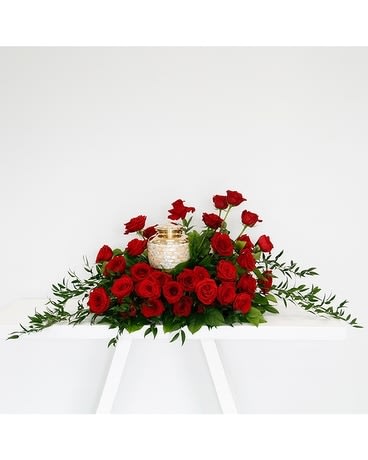 Radiance Cremation Piece - These amazing cremation flowers from the Radiance Collection is stunning with roses, lemon leaf and ruscus foliage