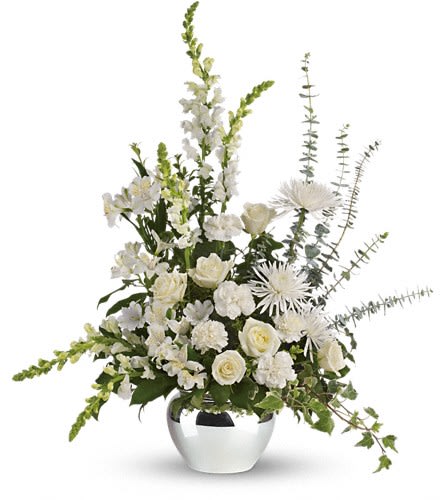 Serene Reflections Bouquet - T265-1A - An elegant expression of caring this beautiful bouquet of white roses and other favorites in a silver jardiniere vase will be a lovely addition to the service. The exquisite bouquet includes white roses white alstroemeria white carnations white snapdragons and white spider chrysanthemums accented with assorted greenery. Delivered in a silver jardinere vase.Approximately 31&quot; W x 35&quot; H Orientation: One-Sided As Shown : T265-1A