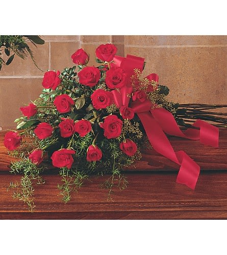 Red Rose Tribute Casket Spray - TF208-2 - This bouquet-style casket spray with its red roses will express your deepest love most passionately. One casket spray arrives decorated with eighteen red roses tied bouquet-style accented with crimson ribbons.Approximately 21&quot; W x 36&quot; H Orientation: One-Sided As Shown : TF208-2