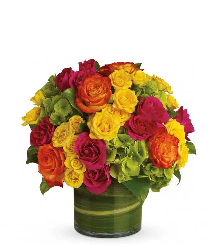 Splash of Color - The rich jewel tones in this arrangement are sure to add a splash of color to any home or office. The mix of roses, spray roses, and hydrangeas are the perfect touch of elegance. 