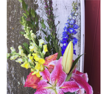 Uplifting mix of bright flowers - Let our designers do what we do best!  We will make a beautiful mix of springy flowers that will be sure to please!
